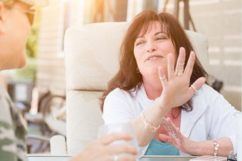 Woman using her hands to talk about her Energy Type