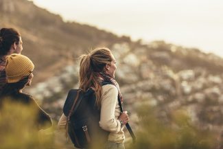 Woman on hike looking out at nature