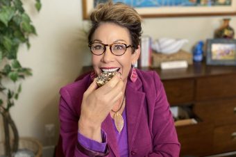 Carol sharing weight loss tips while holding a cupcake